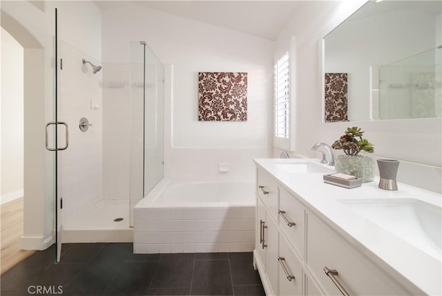 bathroom featuring vanity, tile patterned floors, and shower with separate bathtub