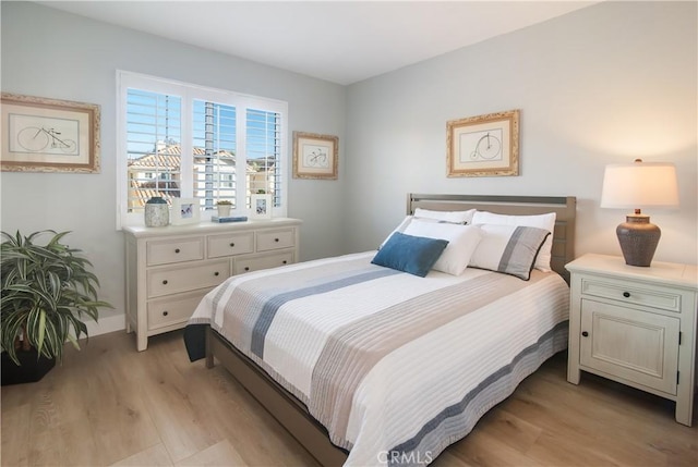 bedroom featuring light hardwood / wood-style flooring