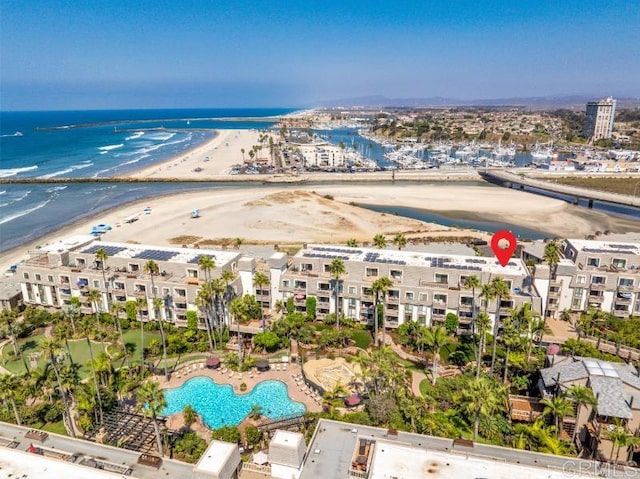 aerial view featuring a water view and a view of the beach