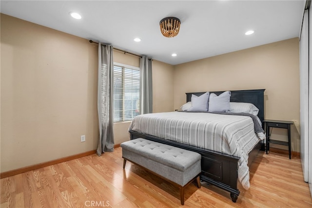 bedroom with light wood-type flooring