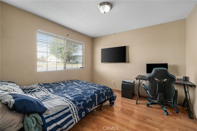 bedroom featuring hardwood / wood-style floors