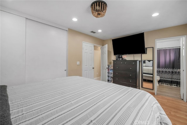 bedroom featuring light hardwood / wood-style floors