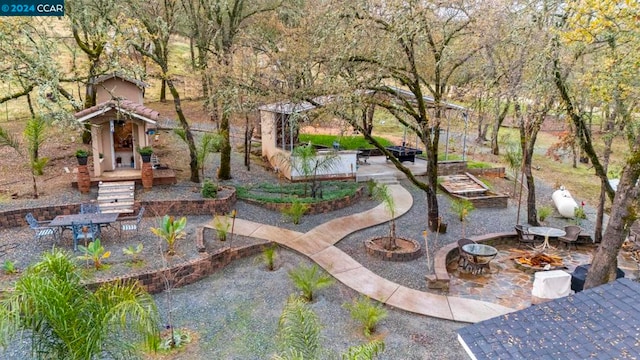 view of property's community featuring a patio area