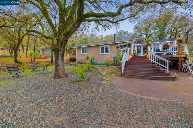 view of front of property with a deck