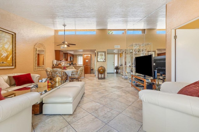 living room featuring ceiling fan