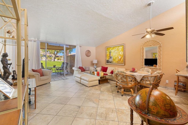 living room with ceiling fan, a textured ceiling, floor to ceiling windows, and vaulted ceiling