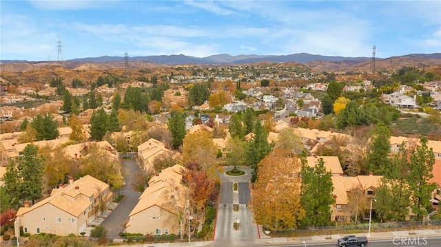 drone / aerial view featuring a mountain view