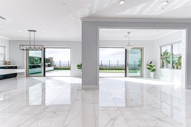 unfurnished living room featuring marble finish floor, crown molding, and an inviting chandelier