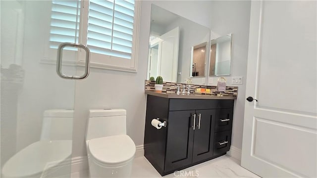 full bathroom featuring marble finish floor, a shower with door, tasteful backsplash, toilet, and vanity