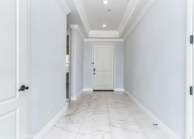 foyer featuring baseboards, marble finish floor, recessed lighting, and crown molding