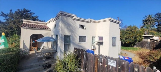 rear view of property with a patio