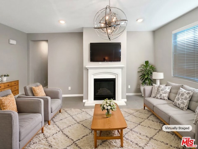 living room with a notable chandelier and light carpet