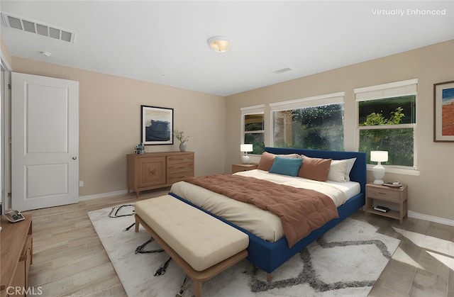 bedroom featuring light hardwood / wood-style floors
