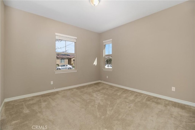 view of carpeted spare room