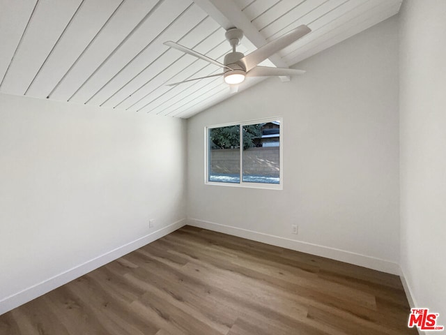 unfurnished room with vaulted ceiling with beams, ceiling fan, hardwood / wood-style floors, and wood ceiling