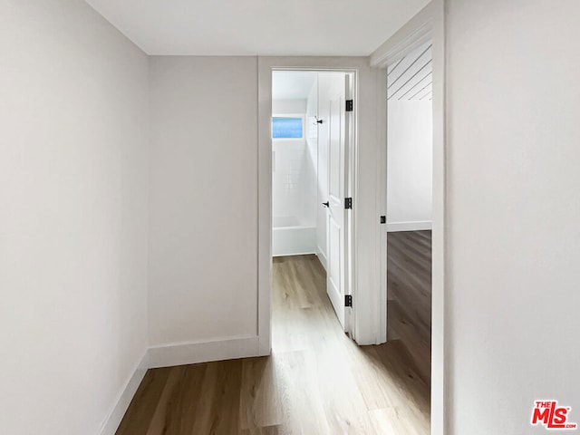 hall featuring light hardwood / wood-style floors