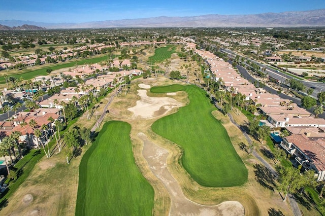 birds eye view of property featuring a mountain view