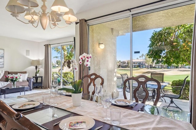 dining room with a chandelier