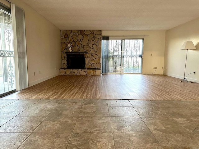 unfurnished living room with a fireplace