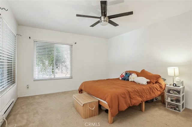 bedroom with light colored carpet, ceiling fan, and a baseboard heating unit