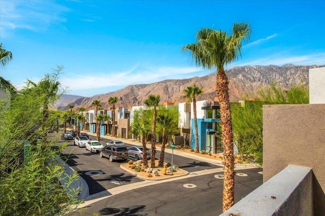 surrounding community featuring a mountain view