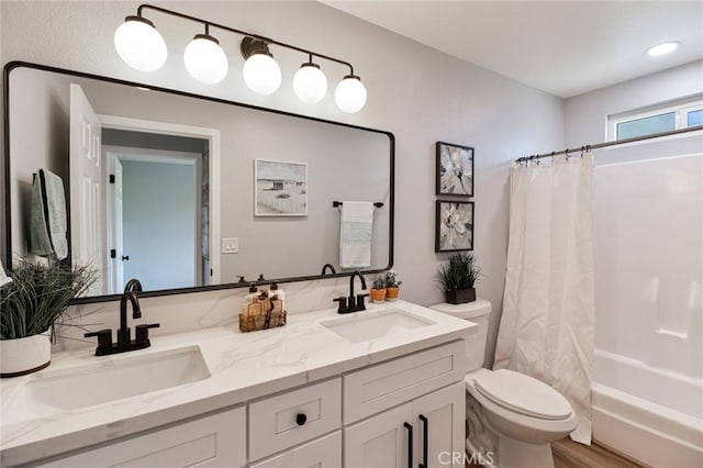 full bathroom with shower / bath combination with curtain, vanity, toilet, and wood-type flooring