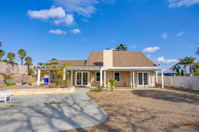 rear view of house with french doors