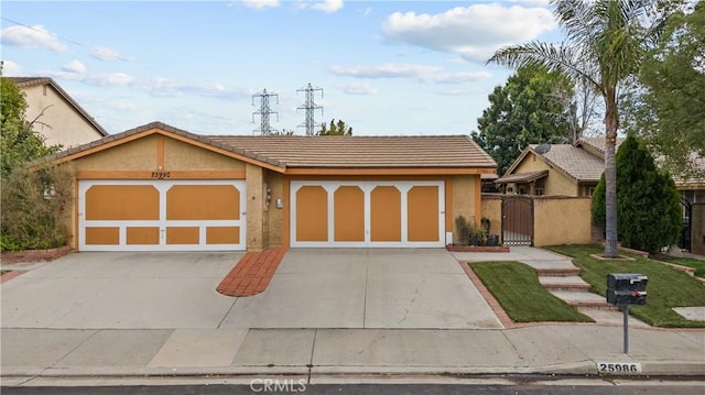 view of front of property with a garage