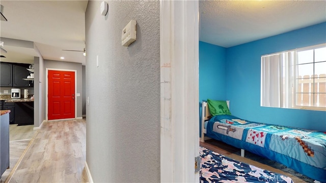 bedroom with light wood-type flooring