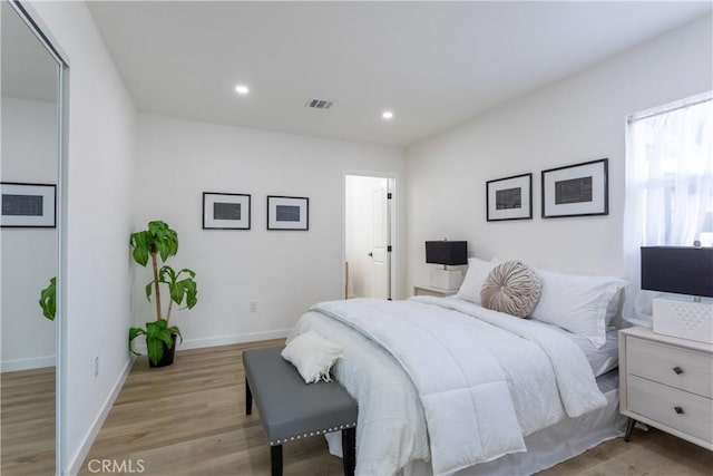 bedroom featuring light hardwood / wood-style floors