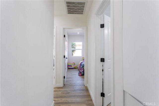 hall featuring light hardwood / wood-style floors