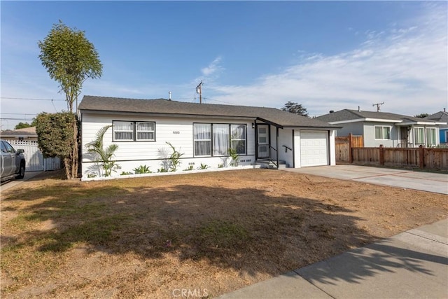 single story home featuring a garage