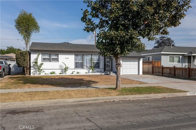 single story home with a garage