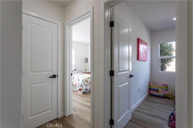 hallway featuring hardwood / wood-style flooring