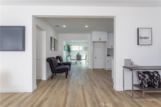 hall featuring light wood-type flooring