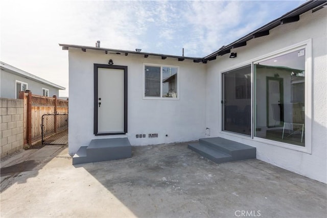 rear view of house featuring a patio area