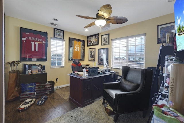 office space featuring dark hardwood / wood-style floors and ceiling fan