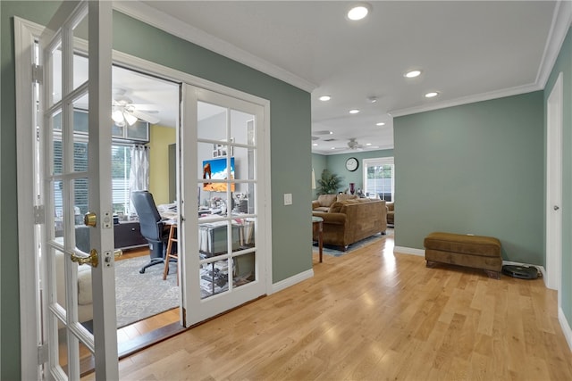 doorway to outside with ceiling fan, french doors, and ornamental molding