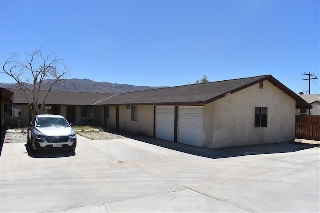 73591 Sunnyslope Dr Unit 29, Palms, CA 92277 - ranch-style home featuring a mountain view and a garage