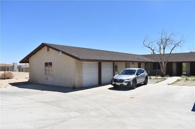 73591 Sunnyslope Dr Unit 29, Palms, CA 92277 - view of front of property with a garage