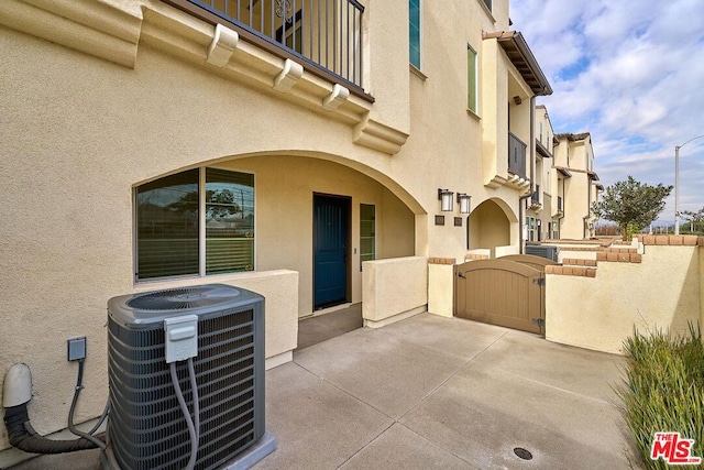 view of patio / terrace featuring cooling unit