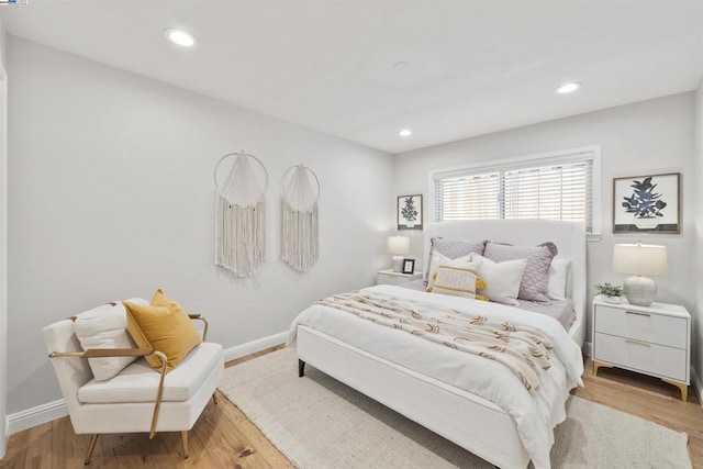 bedroom featuring light wood-type flooring