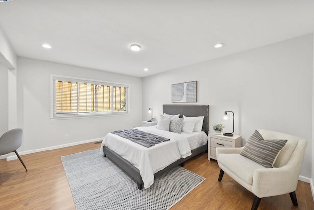 bedroom featuring wood-type flooring