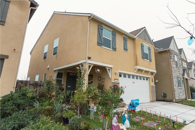 view of front of home with a garage