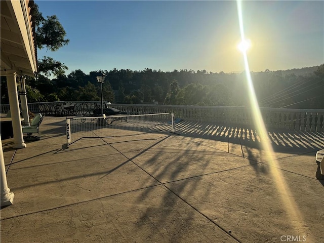 view of patio terrace at dusk