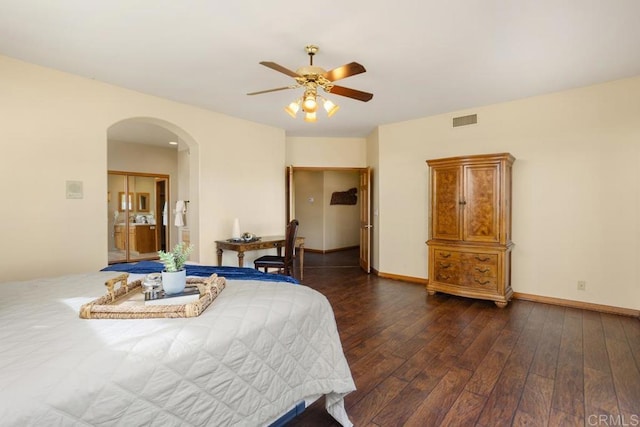 bedroom featuring ceiling fan and dark hardwood / wood-style floors