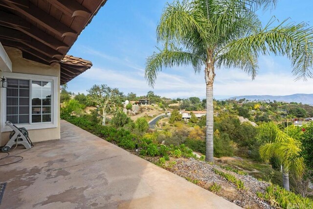 view of patio featuring a mountain view