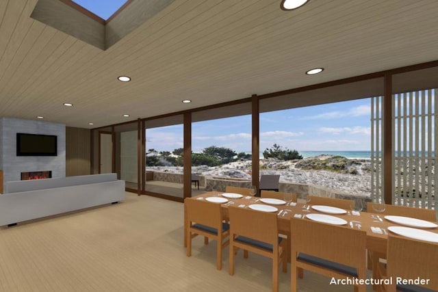 sunroom / solarium featuring a water view, a fireplace, a beach view, and wooden ceiling