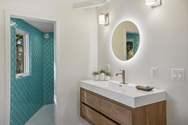 bathroom featuring vanity and a shower with curtain