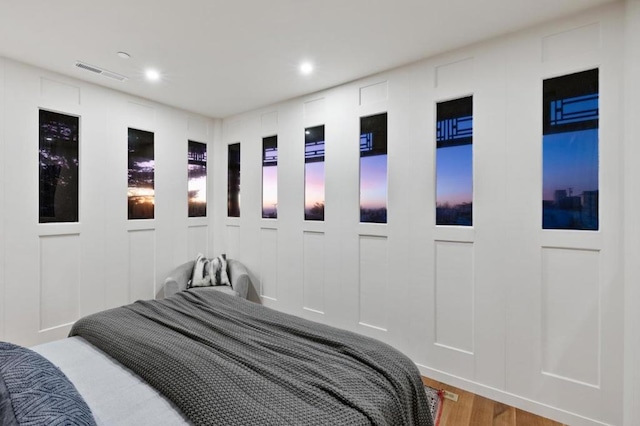 bedroom featuring wood-type flooring